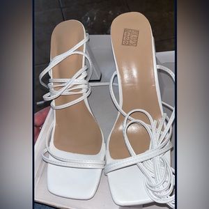 Brand new white heels size 7